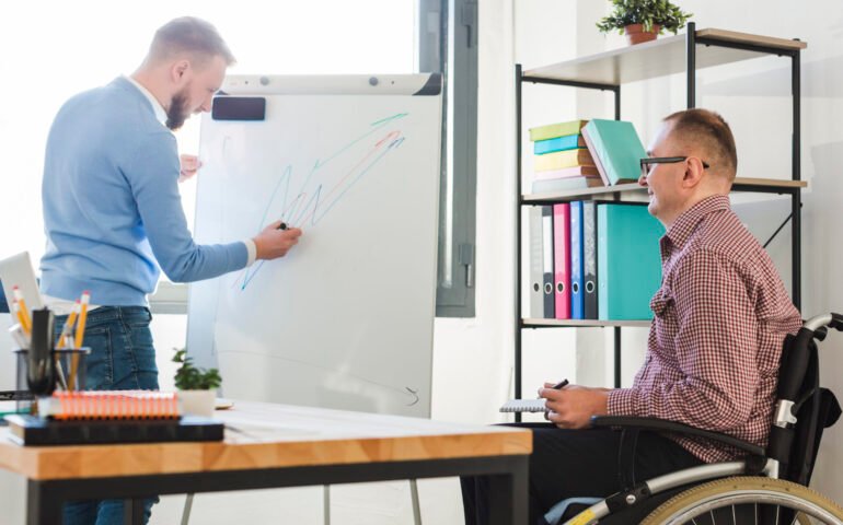 leader-presenting-project-disabled-worker