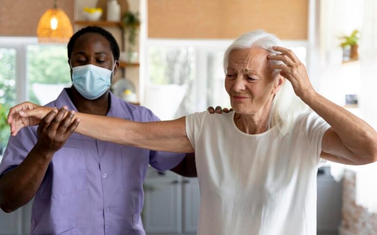 male-social-worker-taking-care-old-woman (1)